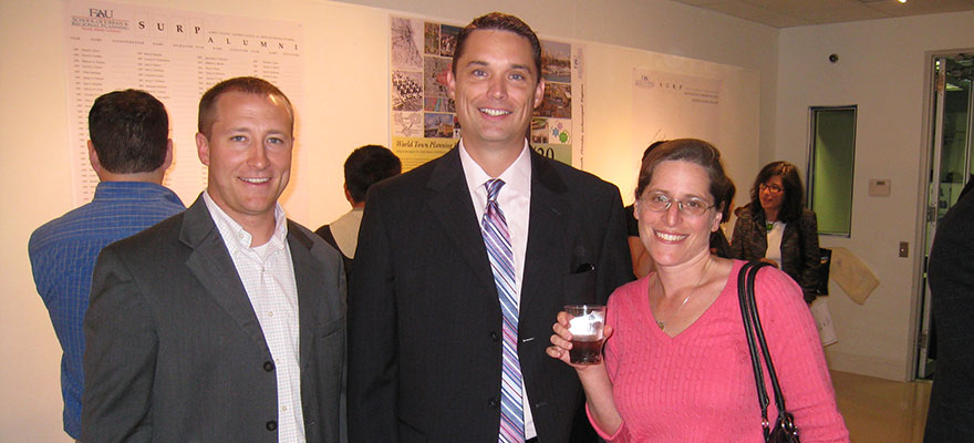 Alumni Chris Barry, Josh Ooyman, and Jennifer Rosenberg enjoy SURP's 20th Anniversary celebration.